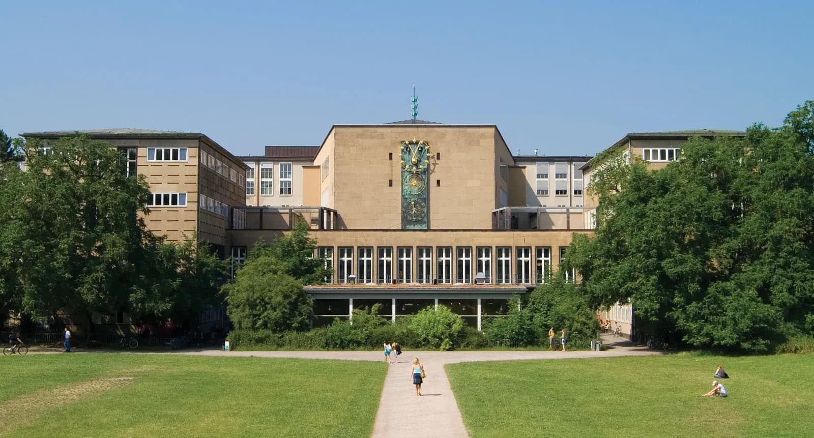 Main building of the University of Cologne, featuring historic architecture and a central urban campus in Cologne, Germany.