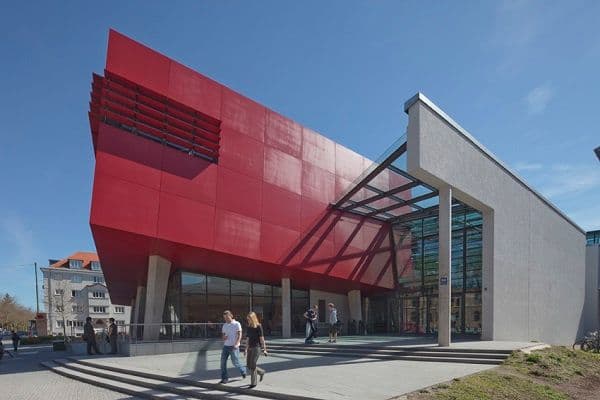 Munich University of Applied Sciences campus with modern classrooms, laboratories, and students engaged in applied learning.